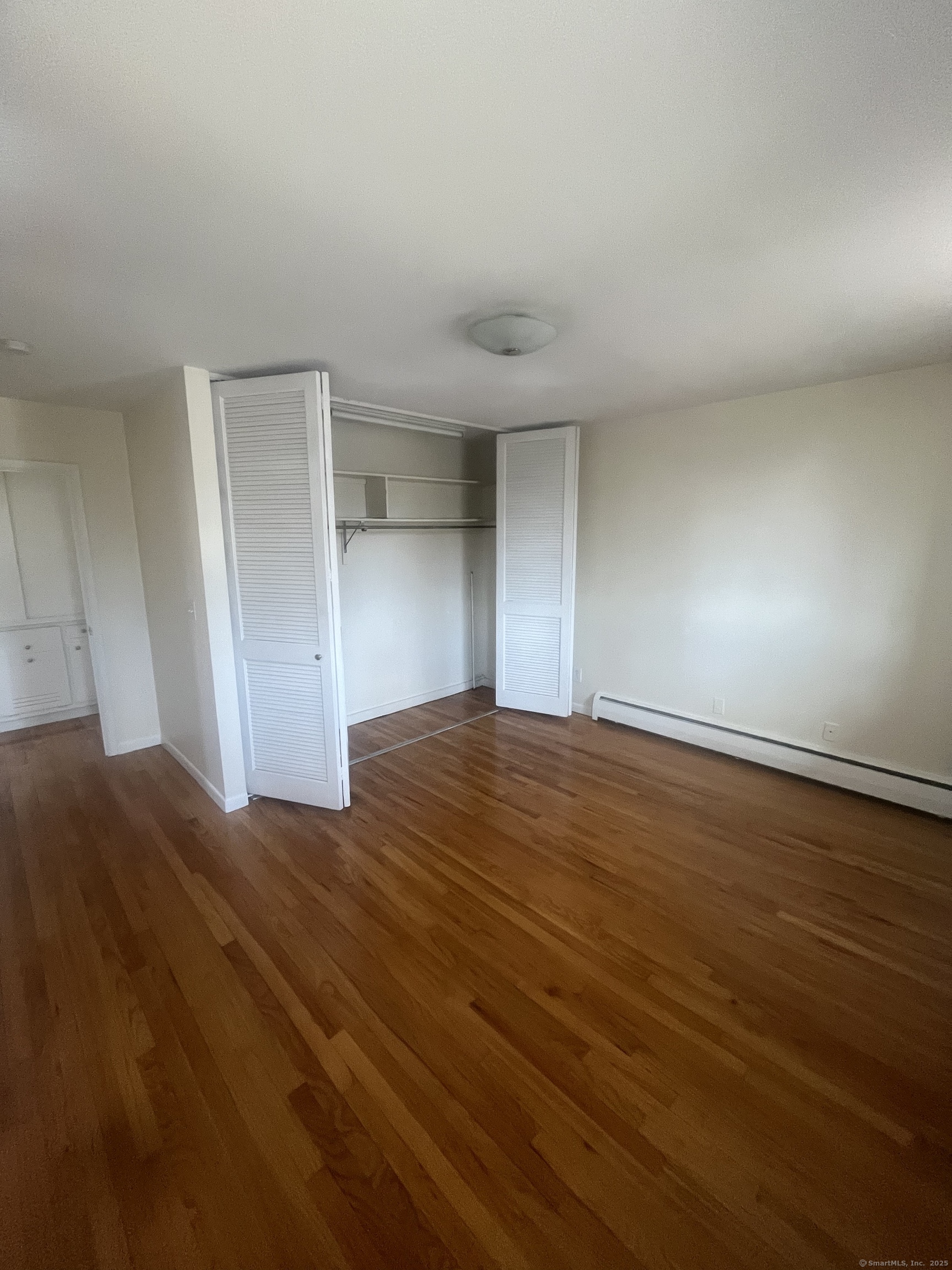 492 Fountain Street, Unit 504C2 New Haven, CT 06515 - Photo 7 of 20 a view of empty room with wooden floor