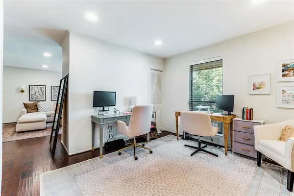 a workspace with furniture and a window