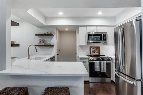 $340,000 | 6020 Birchbrook Drive, Unit 210, Dallas, TX 75206