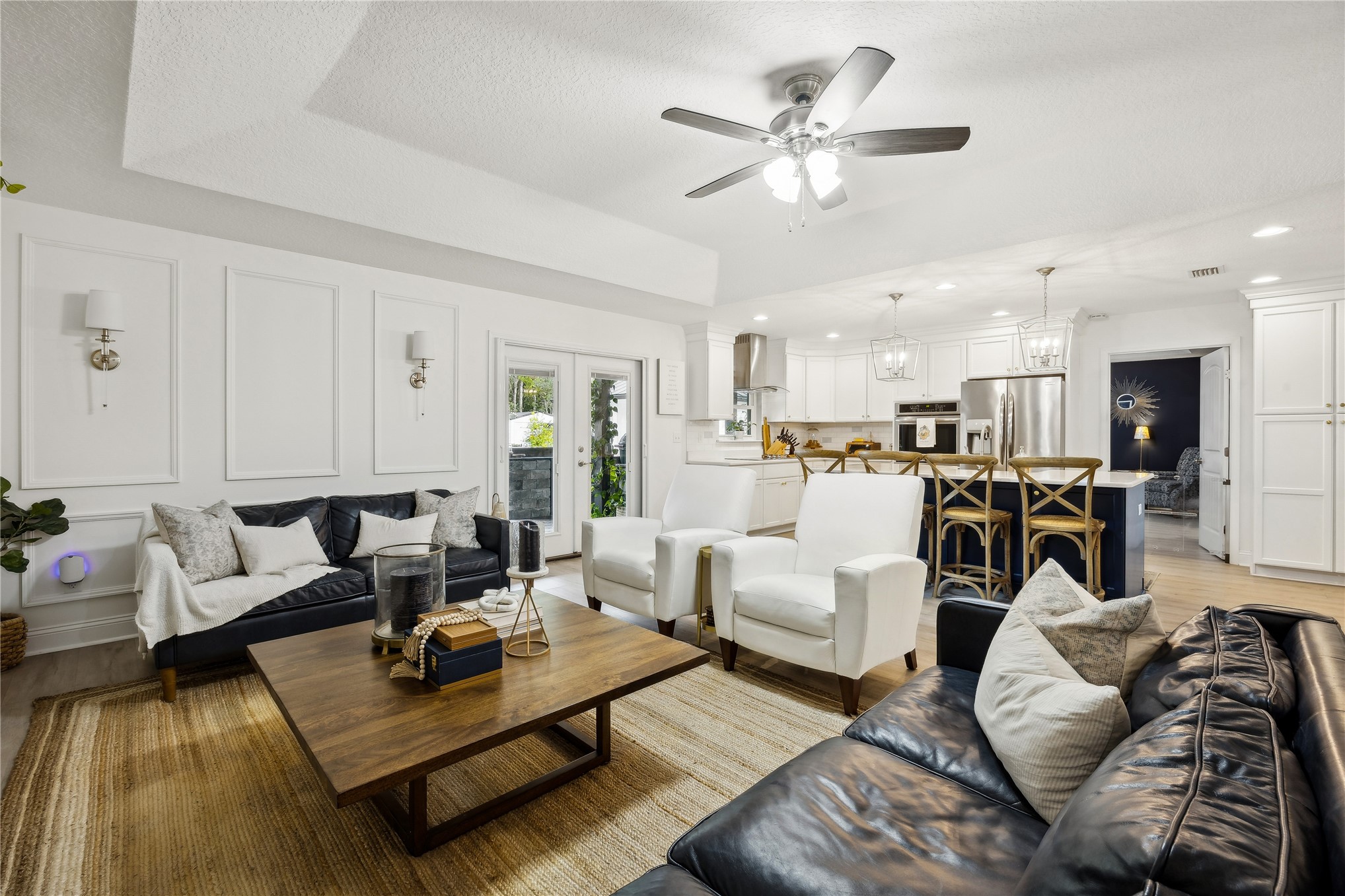 95103 Greenberry Road Fernandina Beach, FL 32034 - Photo 11 of 69 a living room with furniture kitchen view and a chandelier