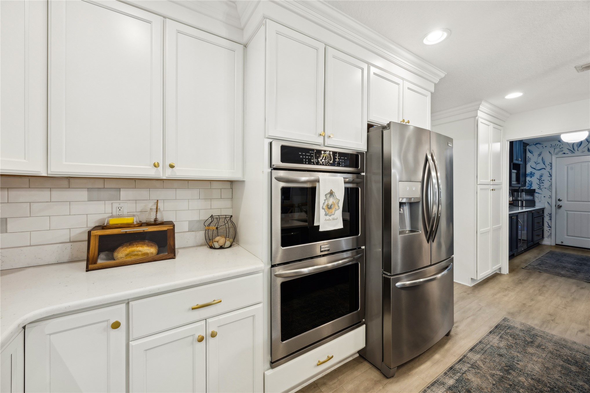 95103 Greenberry Road Fernandina Beach, FL 32034 - Photo 14 of 69 a kitchen with stainless steel appliances a refrigerator a stove a sink and cabinets