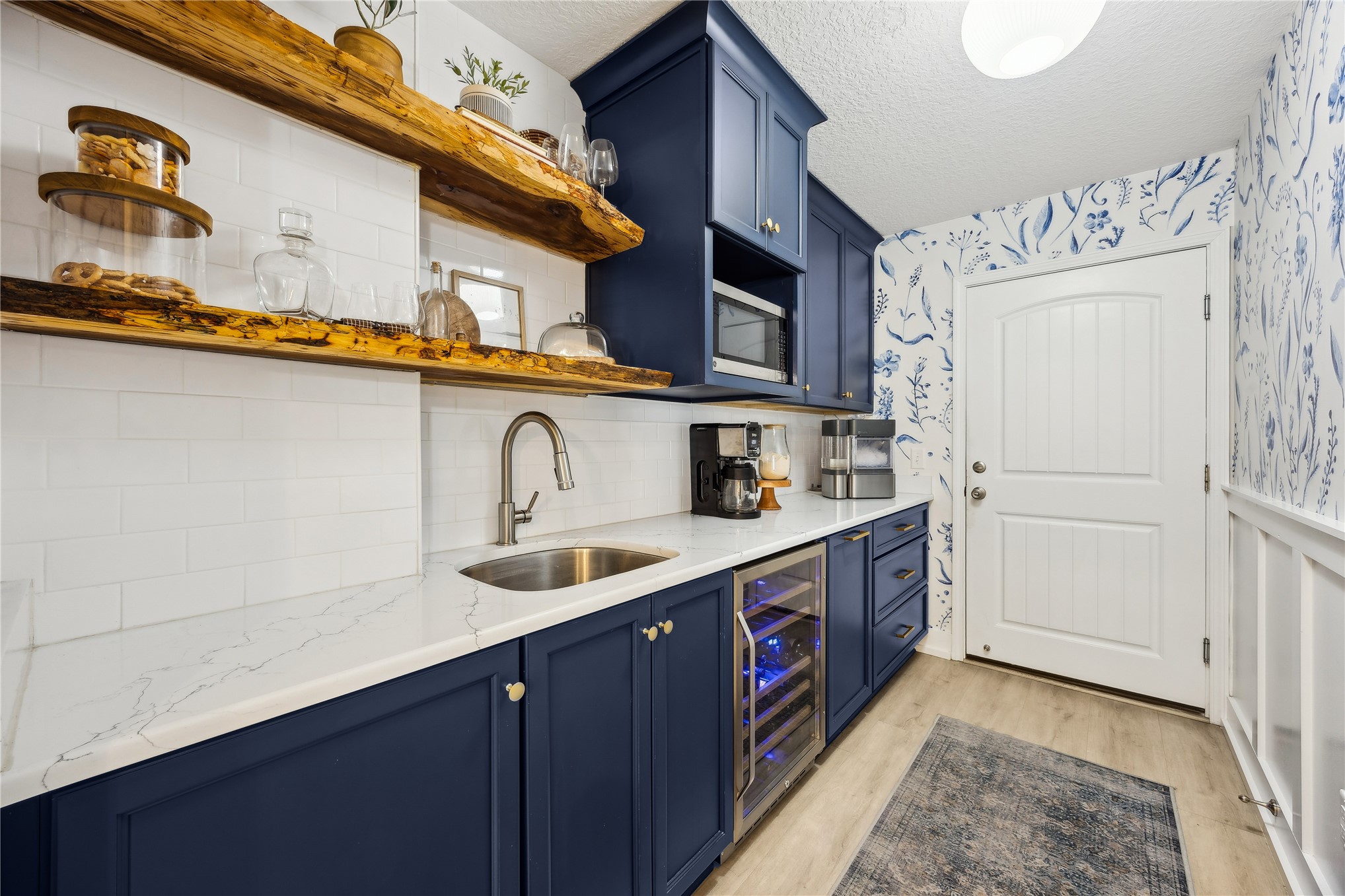 95103 Greenberry Road Fernandina Beach, FL 32034 - Photo 16 of 69 a kitchen with stainless steel appliances granite countertop a sink and a refrigerator