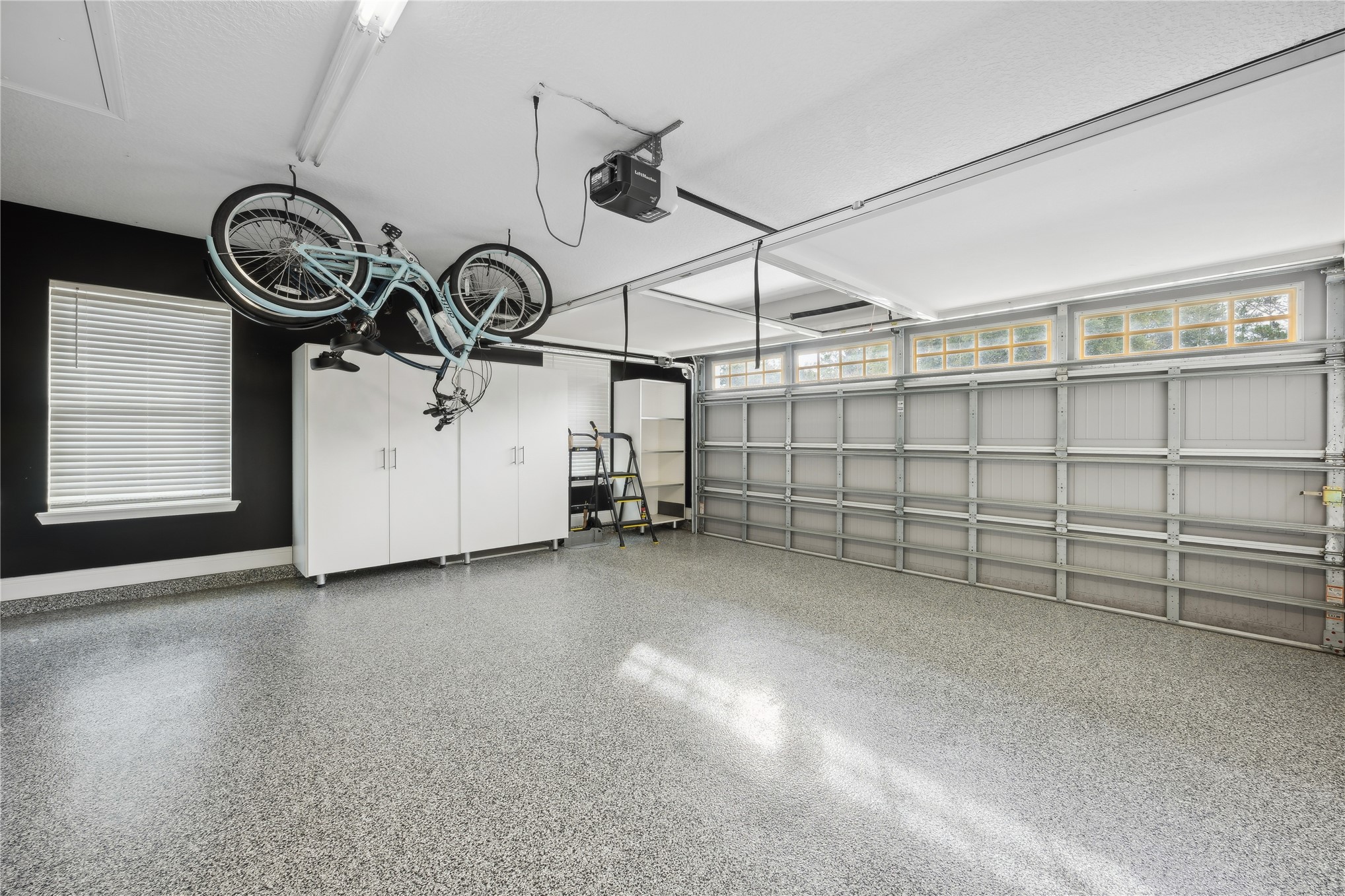95103 Greenberry Road Fernandina Beach, FL 32034 - Photo 27 of 69 a view of a garage with racks on the wall