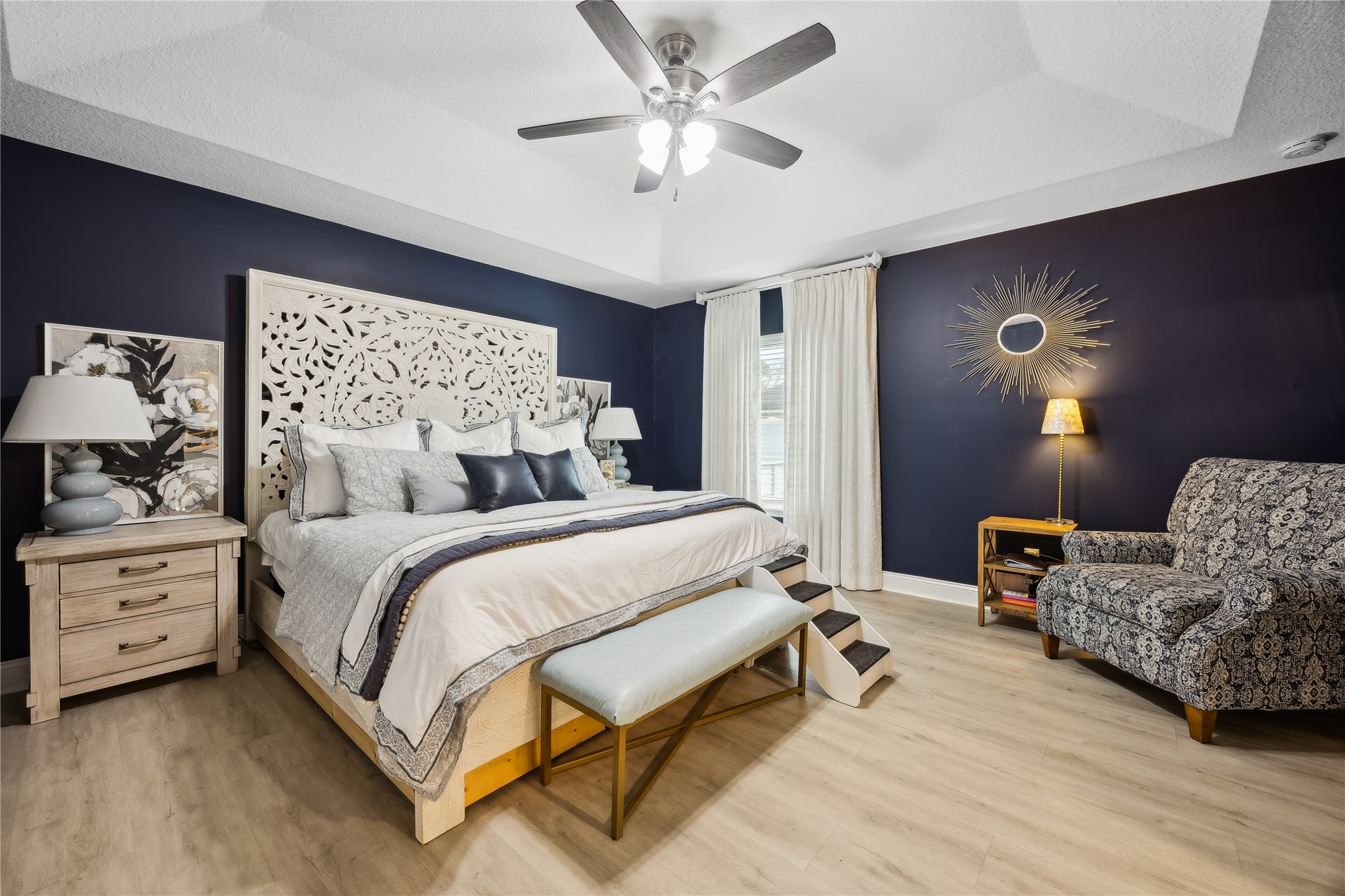 95103 Greenberry Road Fernandina Beach, FL 32034 - Photo 3 of 69 a bedroom with a bed and a chandelier