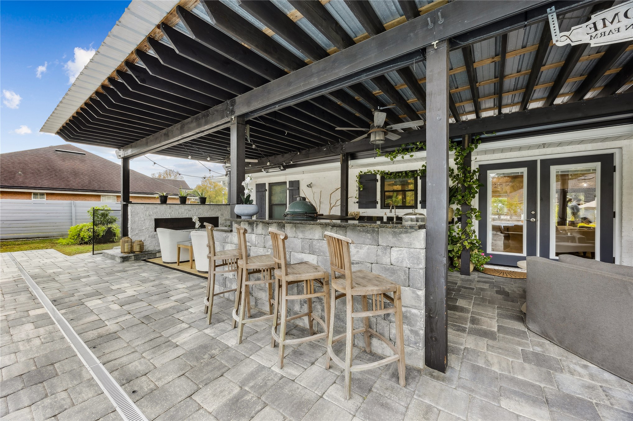 95103 Greenberry Road Fernandina Beach, FL 32034 - Photo 31 of 69 a view of a porch with chairs and table