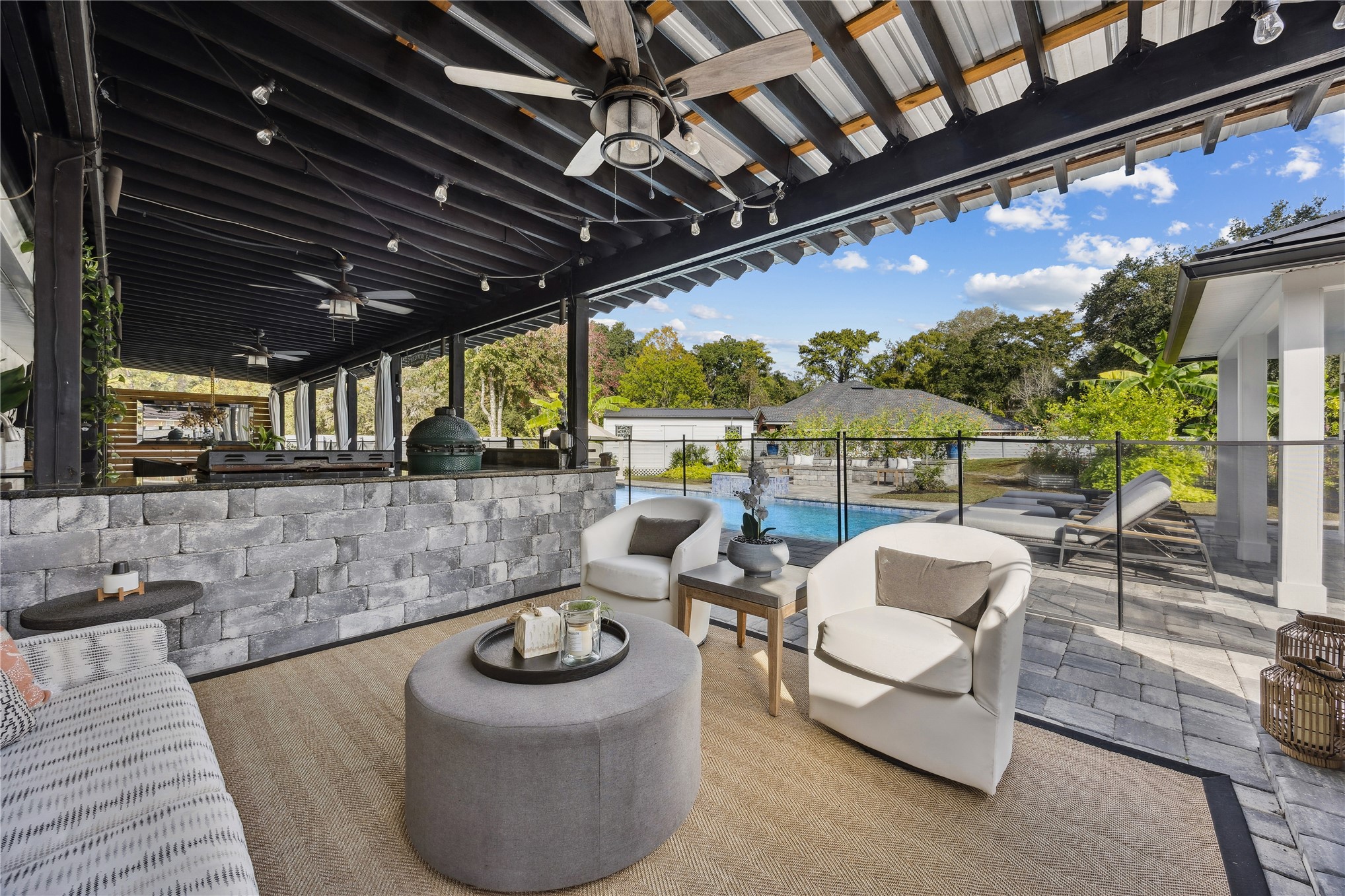 95103 Greenberry Road Fernandina Beach, FL 32034 - Photo 35 of 69 a patio outdoor space with patio furniture and a fireplace