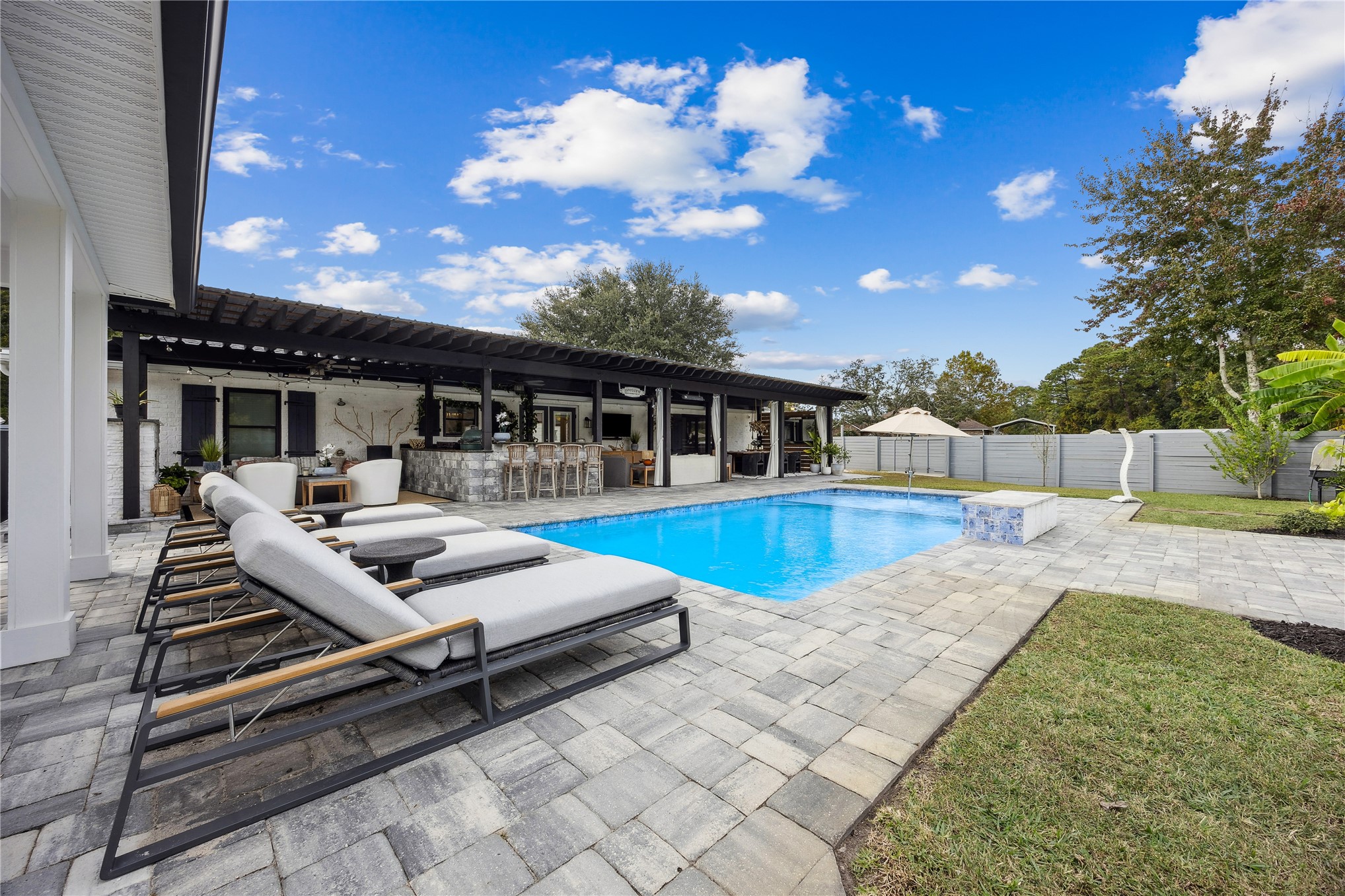 95103 Greenberry Road Fernandina Beach, FL 32034 - Photo 43 of 69 a view of house with swimming pool outdoor seating