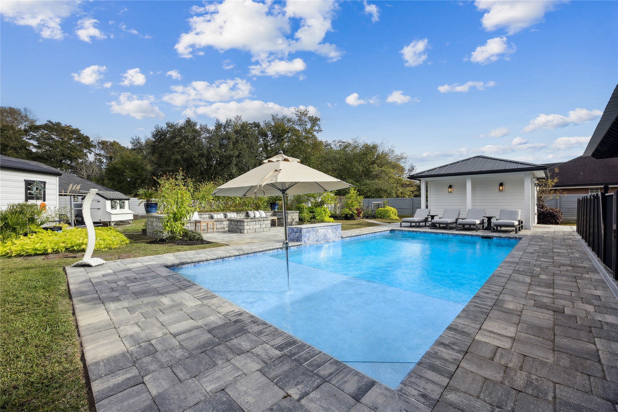 95103 Greenberry Road Fernandina Beach, FL 32034 - Photo 45 of 69 a view of a house with swimming pool and sitting area