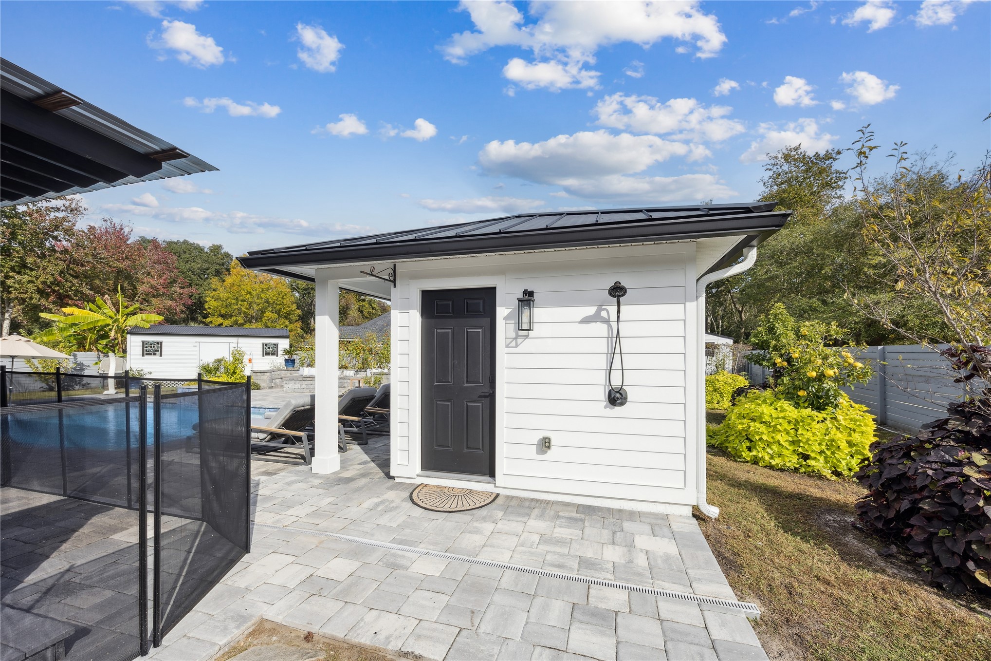 95103 Greenberry Road Fernandina Beach, FL 32034 - Photo 46 of 69 a front view of a house with a porch