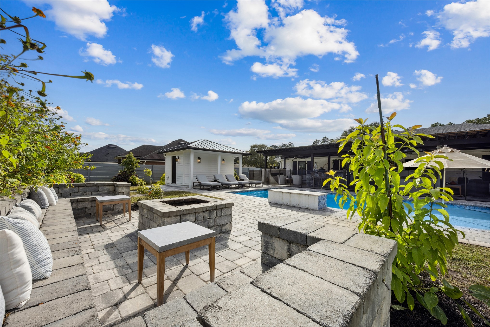 95103 Greenberry Road Fernandina Beach, FL 32034 - Photo 51 of 69 a view of a patio with couches and potted plants