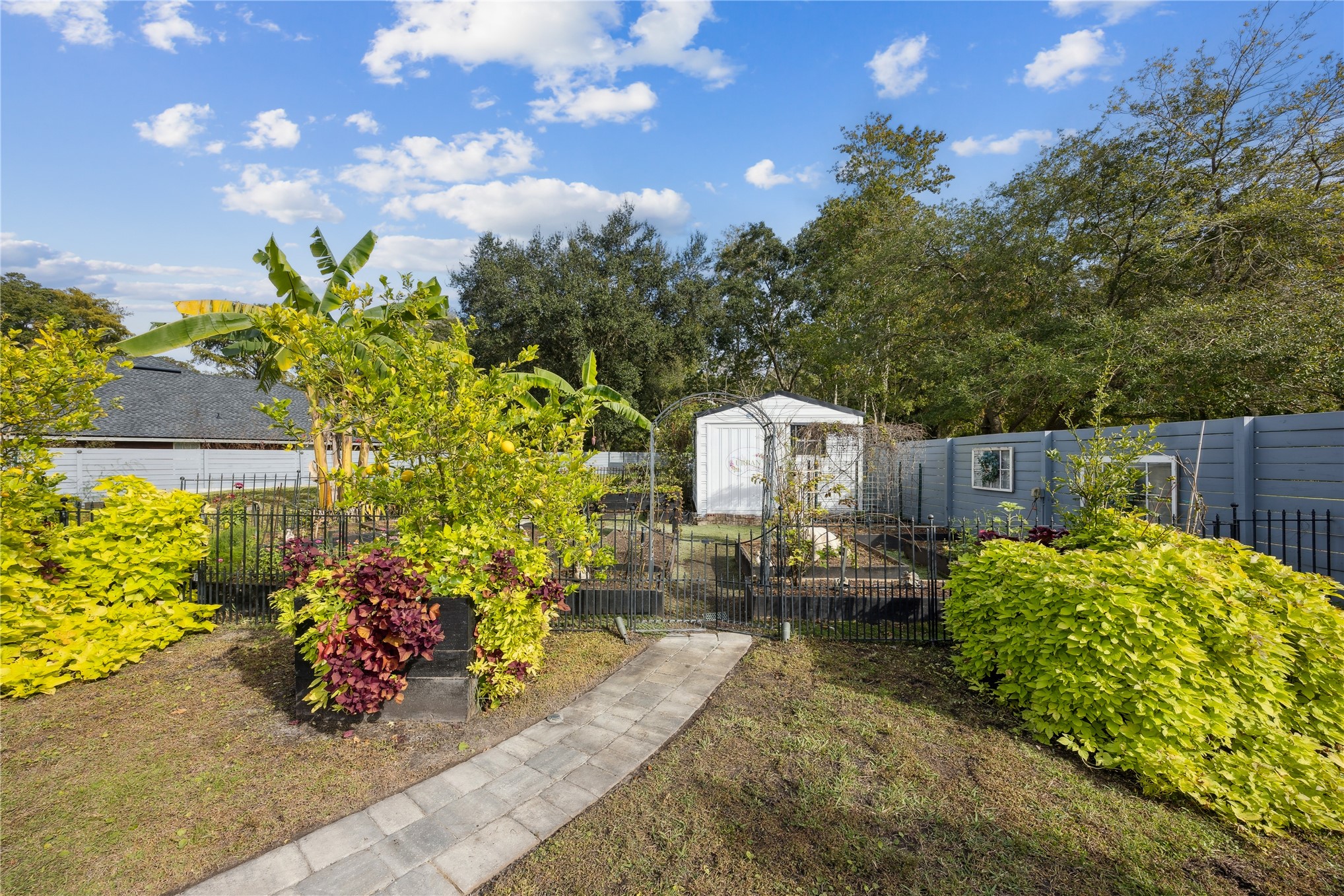 95103 Greenberry Road Fernandina Beach, FL 32034 - Photo 60 of 69 a view of a backyard with sitting area and furniture