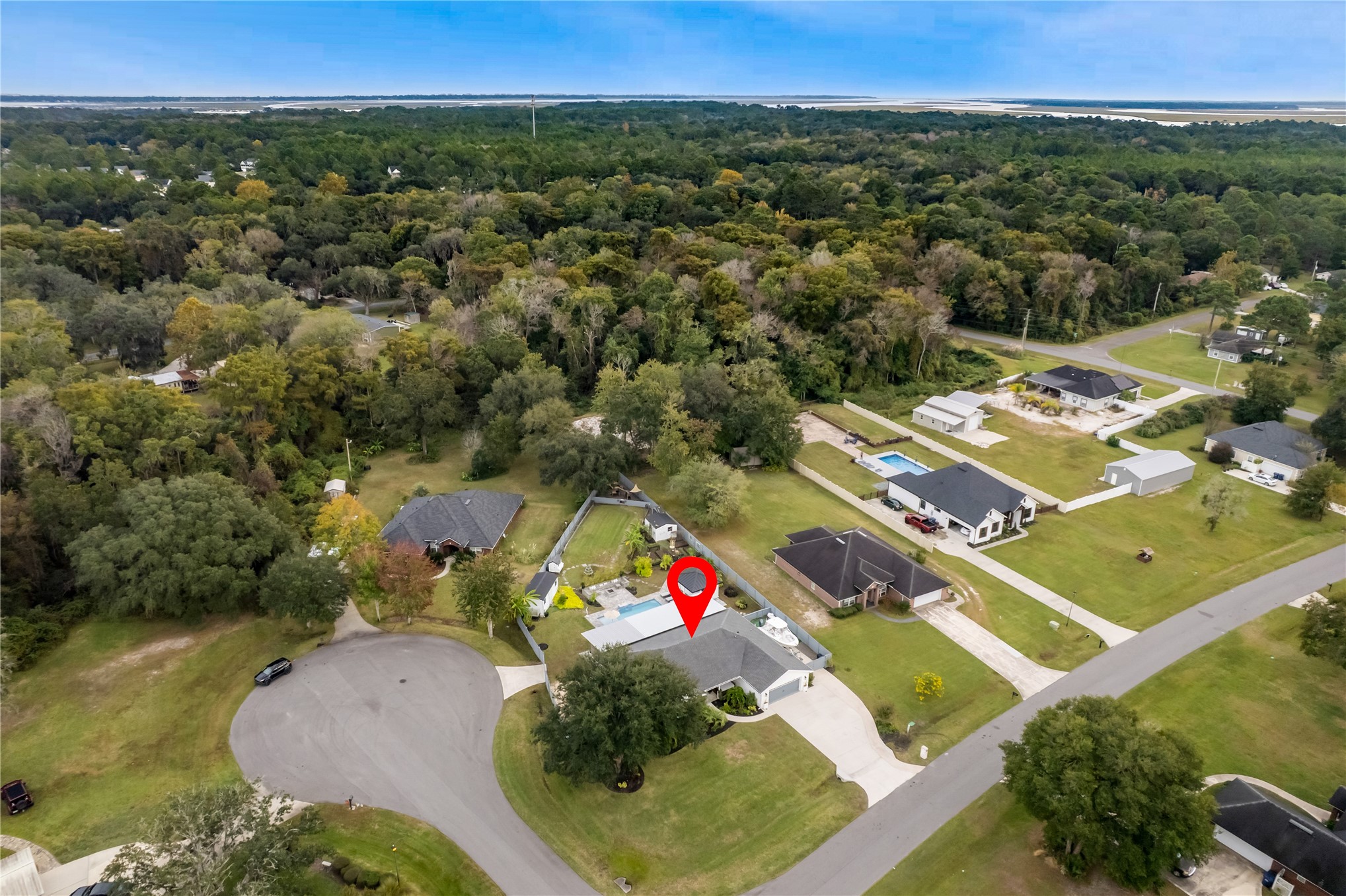 95103 Greenberry Road Fernandina Beach, FL 32034 - Photo 67 of 69 an aerial view of residential houses with outdoor space and swimming pool