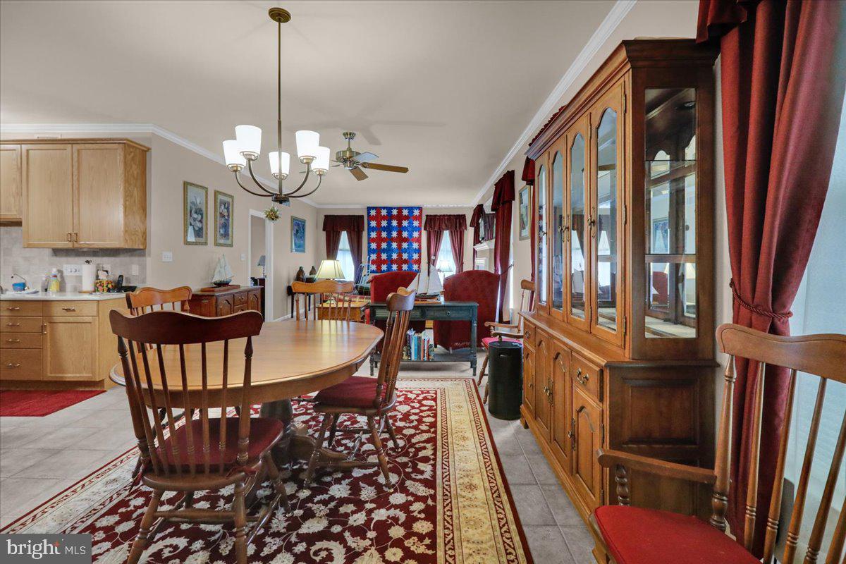 55 Turning Leaf Way Reading, PA 19605 - Photo 14 of 37 a view of a dining room with furniture window and wooden floor
