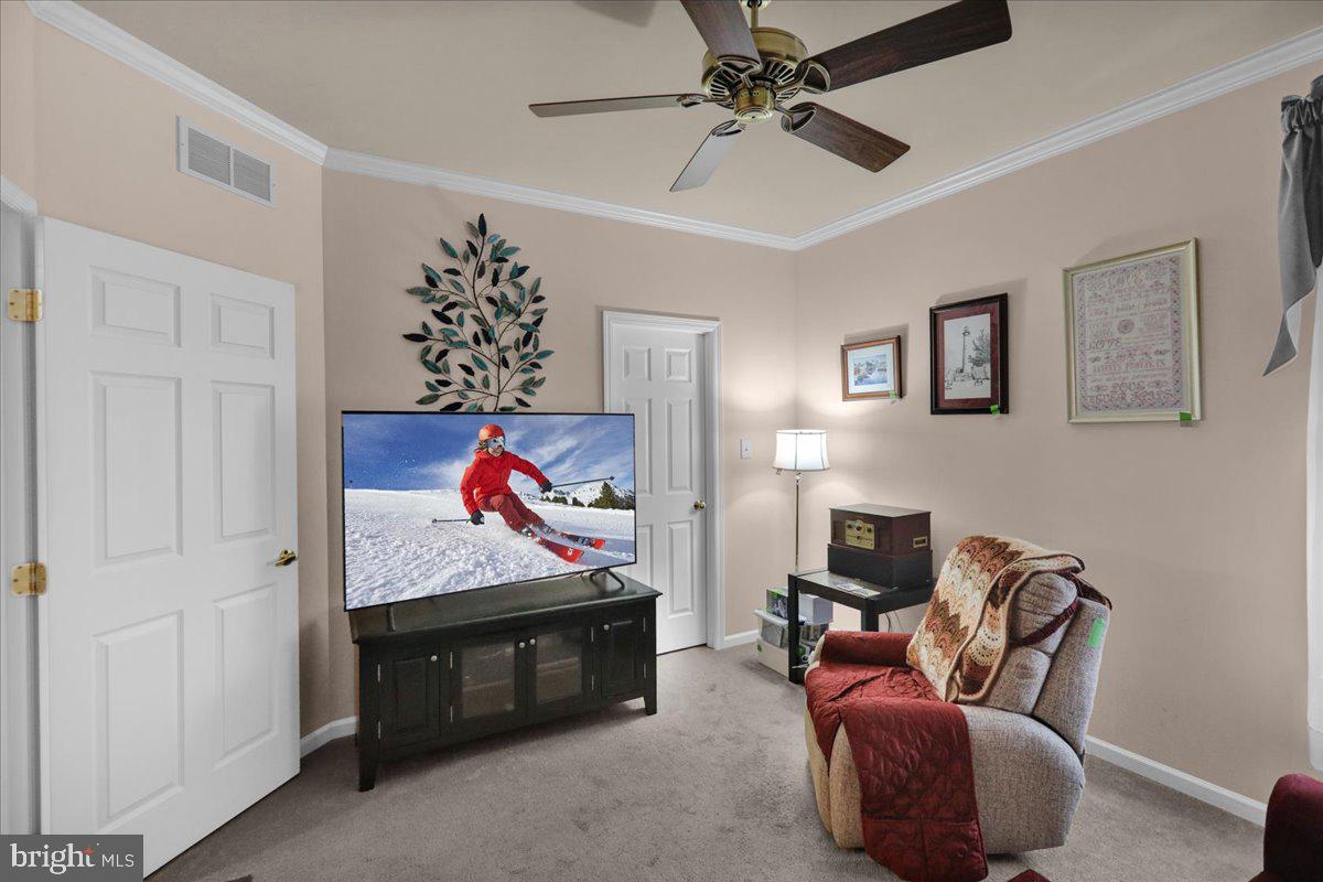 55 Turning Leaf Way Reading, PA 19605 - Photo 20 of 37 a living room with furniture and a flat screen tv