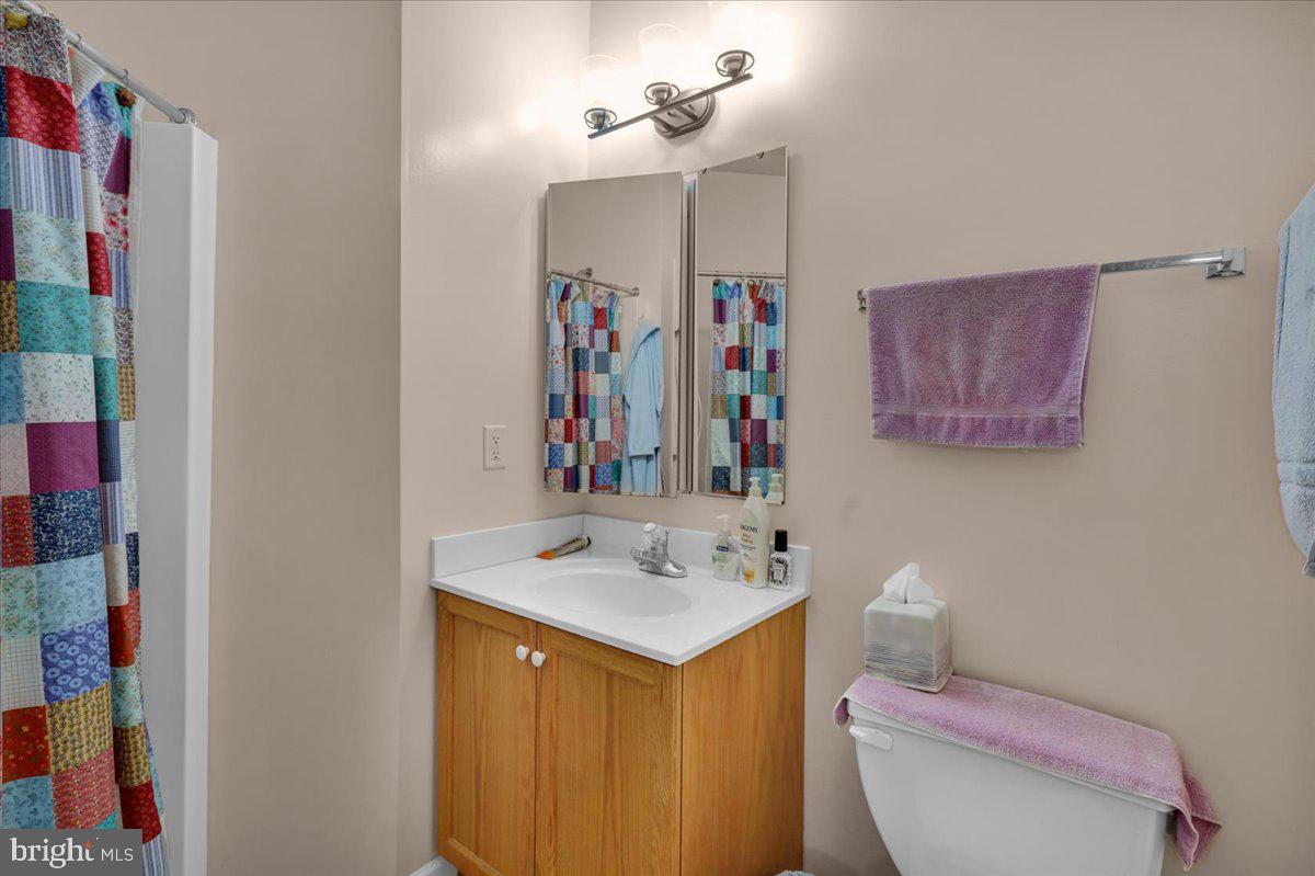 55 Turning Leaf Way Reading, PA 19605 - Photo 21 of 37 a bathroom with a sink vanity mirror and toilet