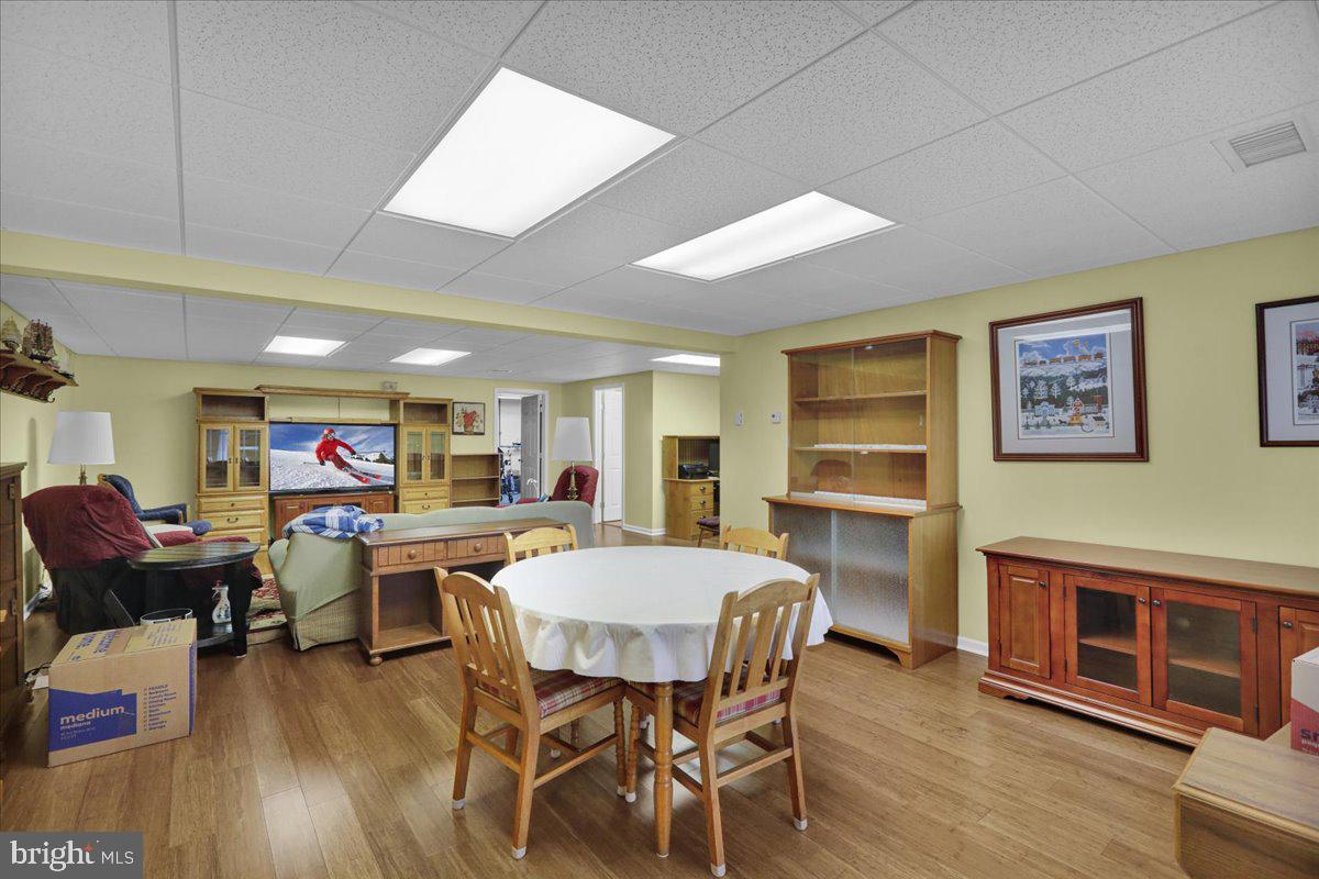 55 Turning Leaf Way Reading, PA 19605 - Photo 26 of 37 a view of a dining room with furniture window and wooden floor