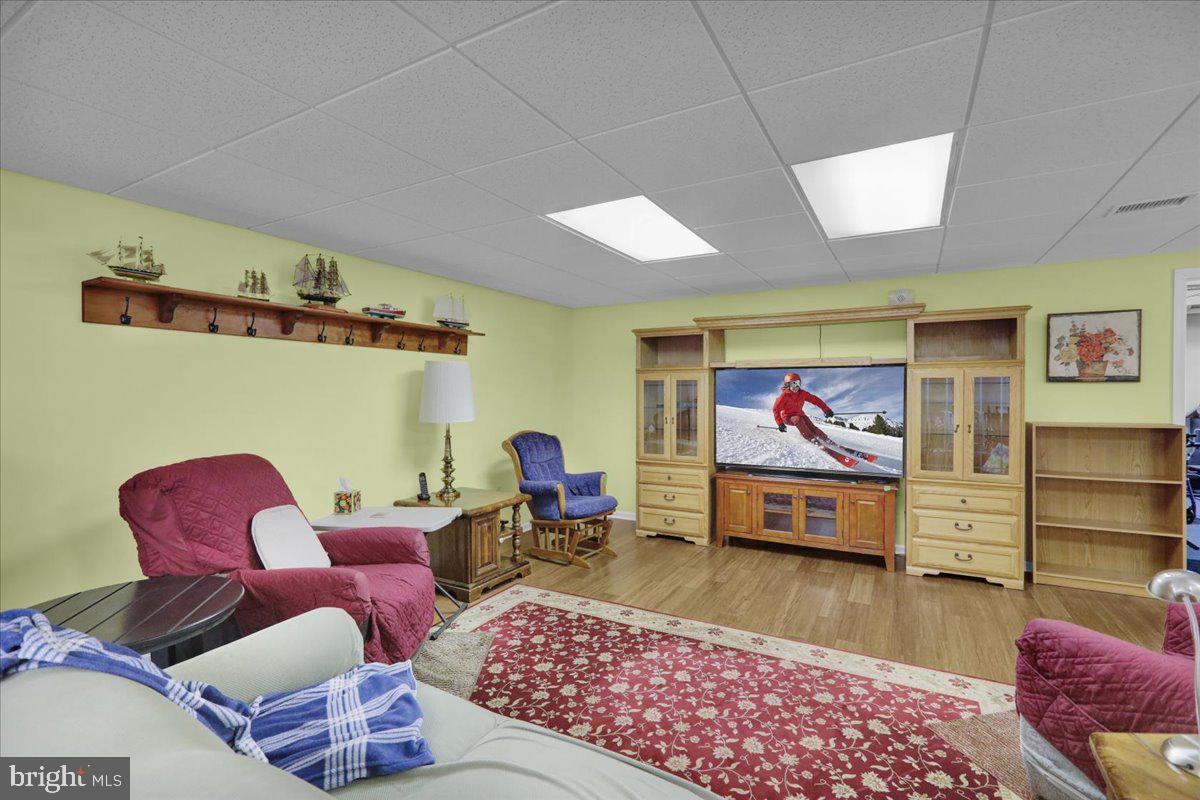 55 Turning Leaf Way Reading, PA 19605 - Photo 27 of 37 a living room with furniture and a rug