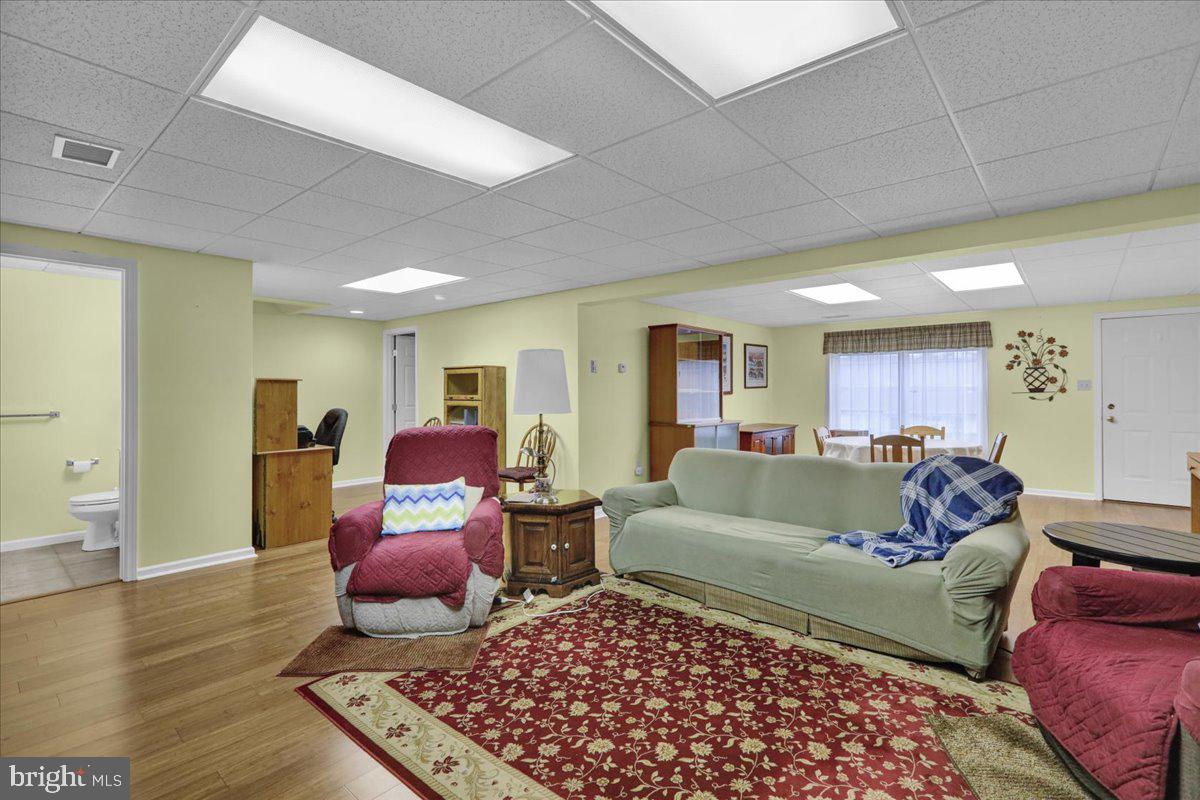 55 Turning Leaf Way Reading, PA 19605 - Photo 30 of 37 a living room with furniture and wooden floor