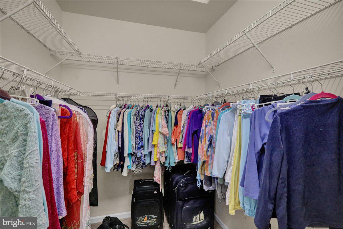 55 Turning Leaf Way Reading, PA 19605 - Photo 5 of 37 a view of walk in closet with clothes