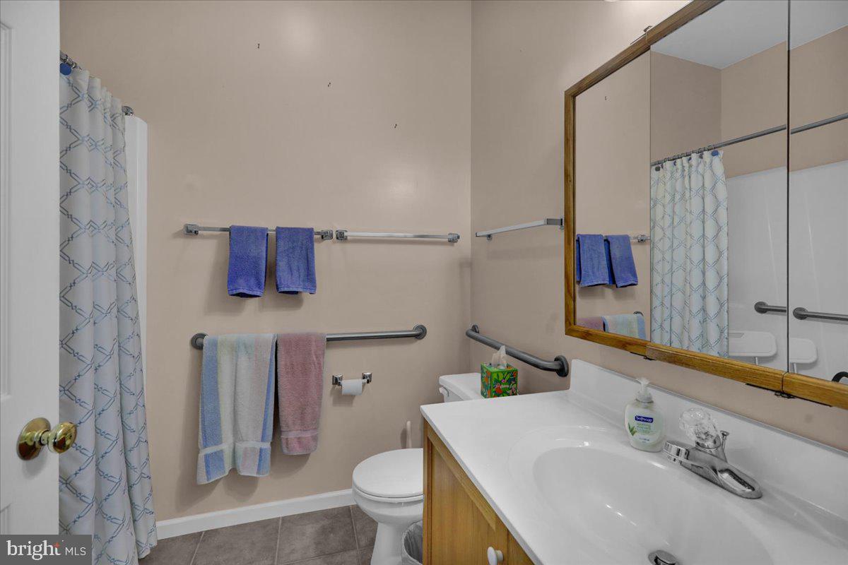 55 Turning Leaf Way Reading, PA 19605 - Photo 7 of 37 a bathroom with a sink toilet and shower