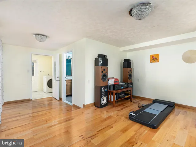 a view of workspace with wooden floor