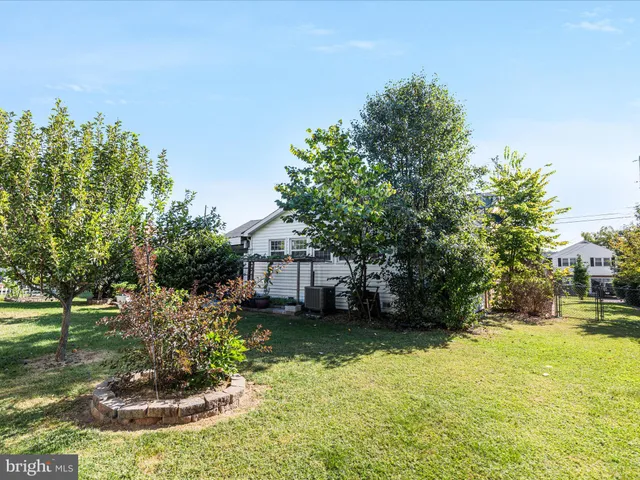 front view of a house with a garden