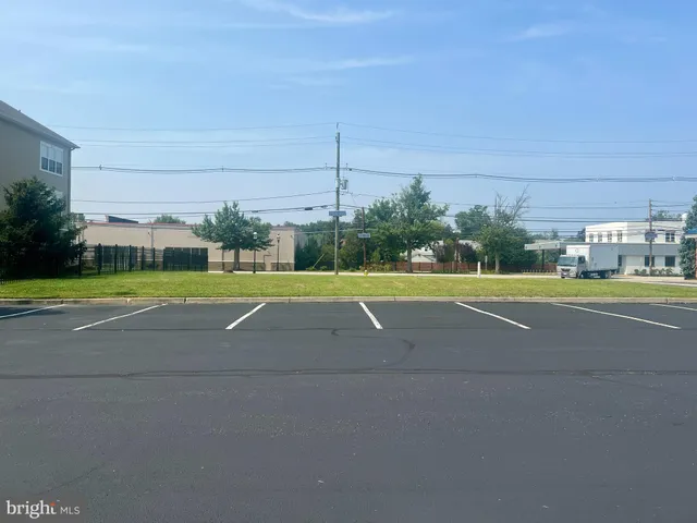 a view of a building and a big yard
