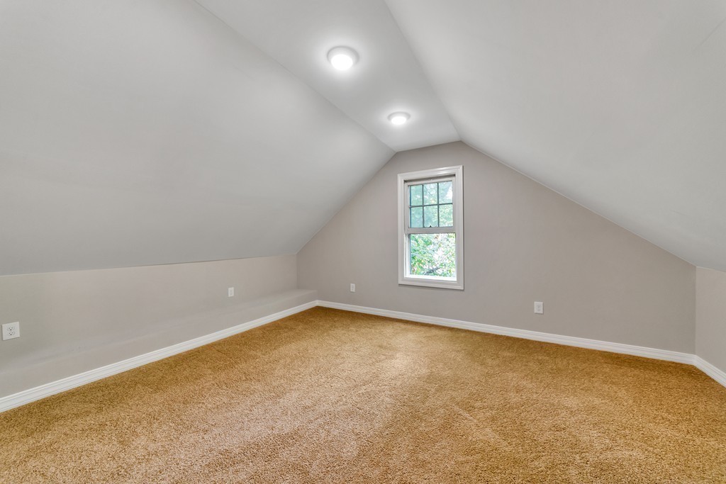 48 Drexel Street Springfield, MA 01104 - Photo 15 of 24 an empty room with a empty space and window