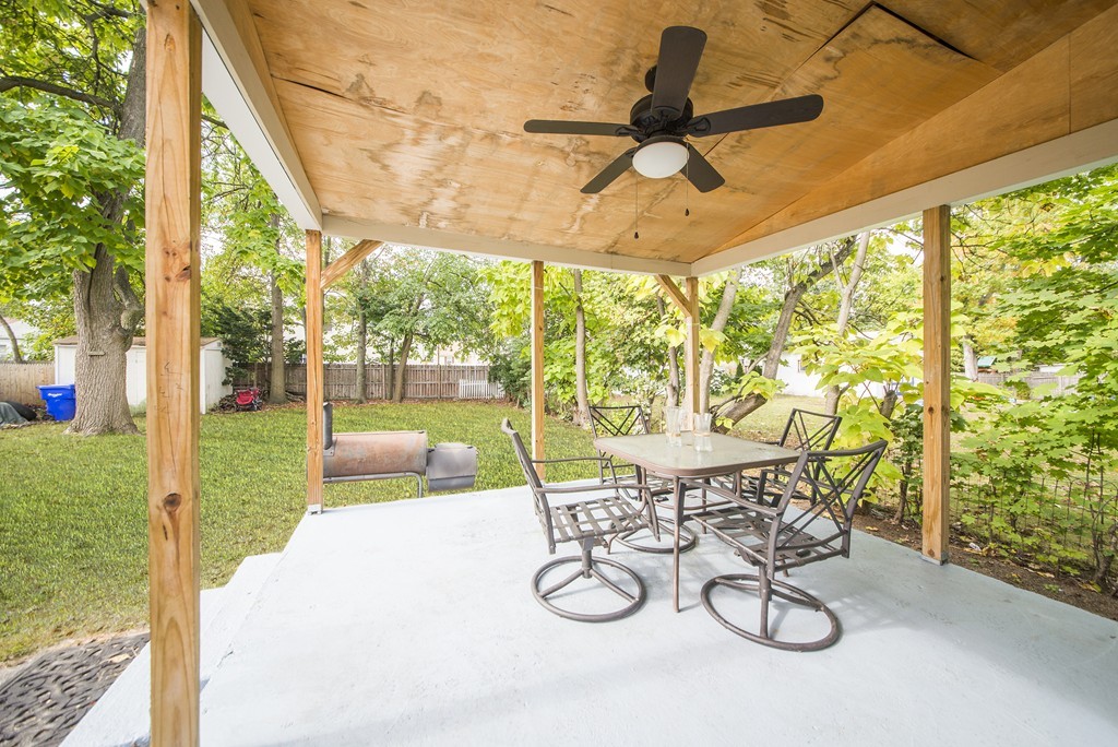 48 Drexel Street Springfield, MA 01104 - Photo 21 of 24 a view of a patio with chairs and table in patio