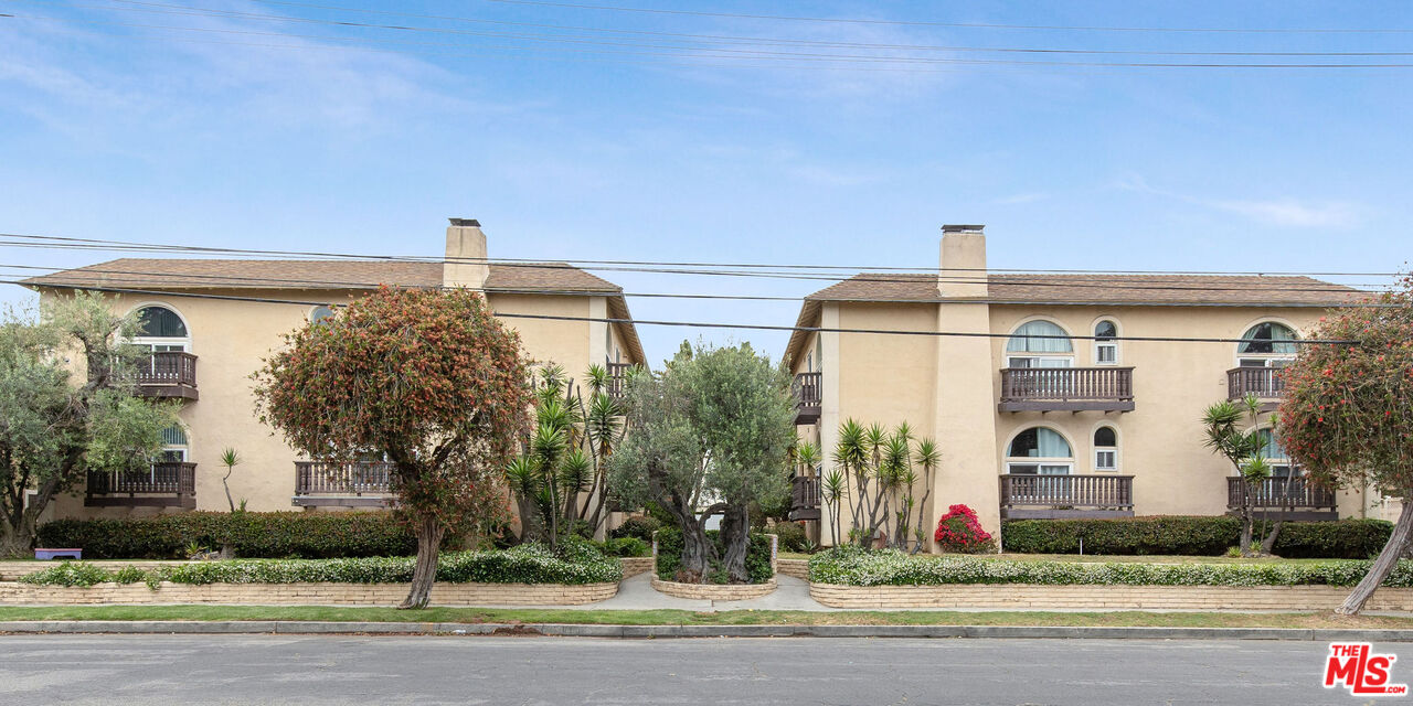 8155 Manitoba Street, Unit 12 Playa del Rey, CA 90293 - Photo 15 of 16 a front view of a house with garden