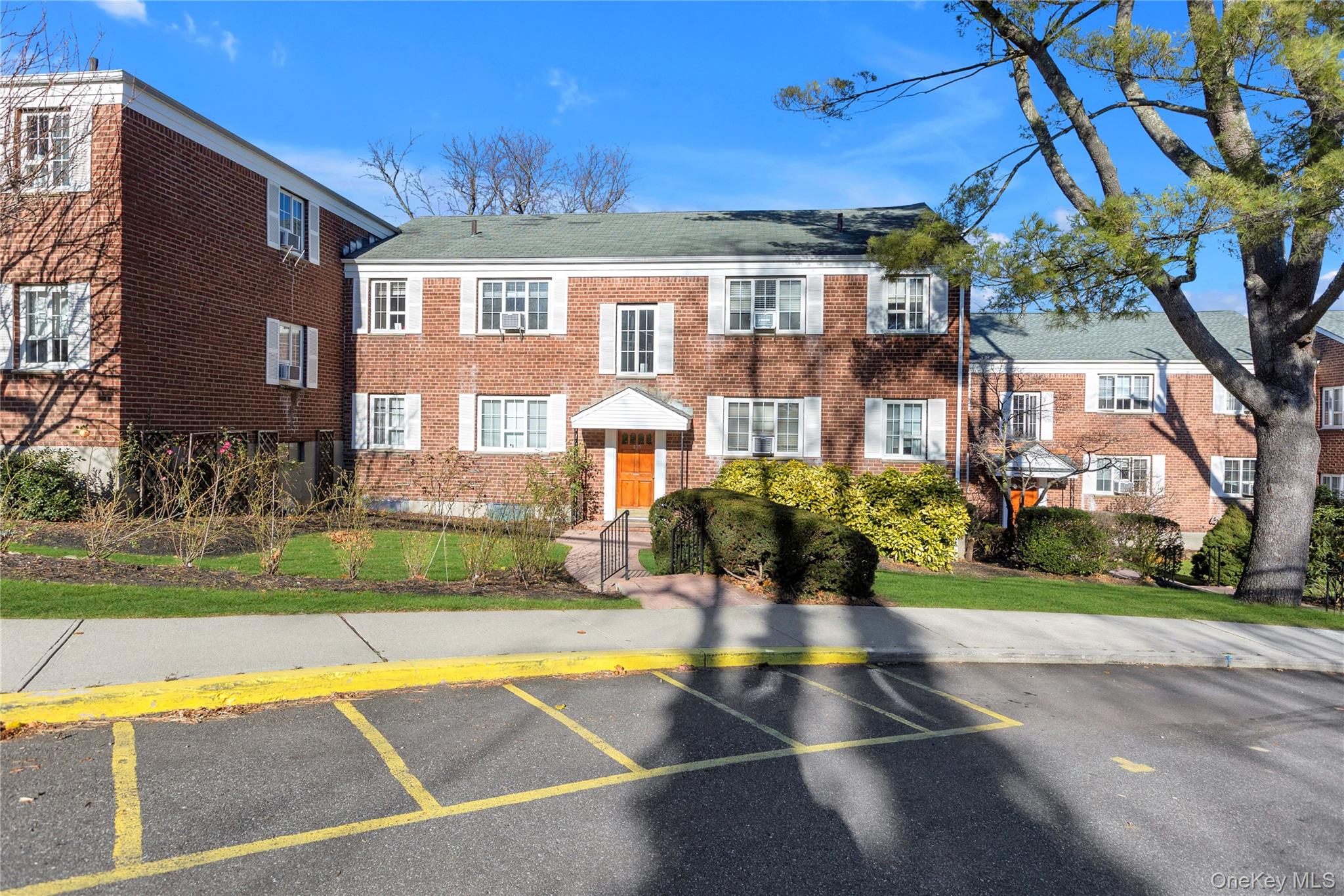 425 Main Street, Unit 92A Huntington, NY 11743 - Photo 11 of 13 a view of a house with a swimming pool