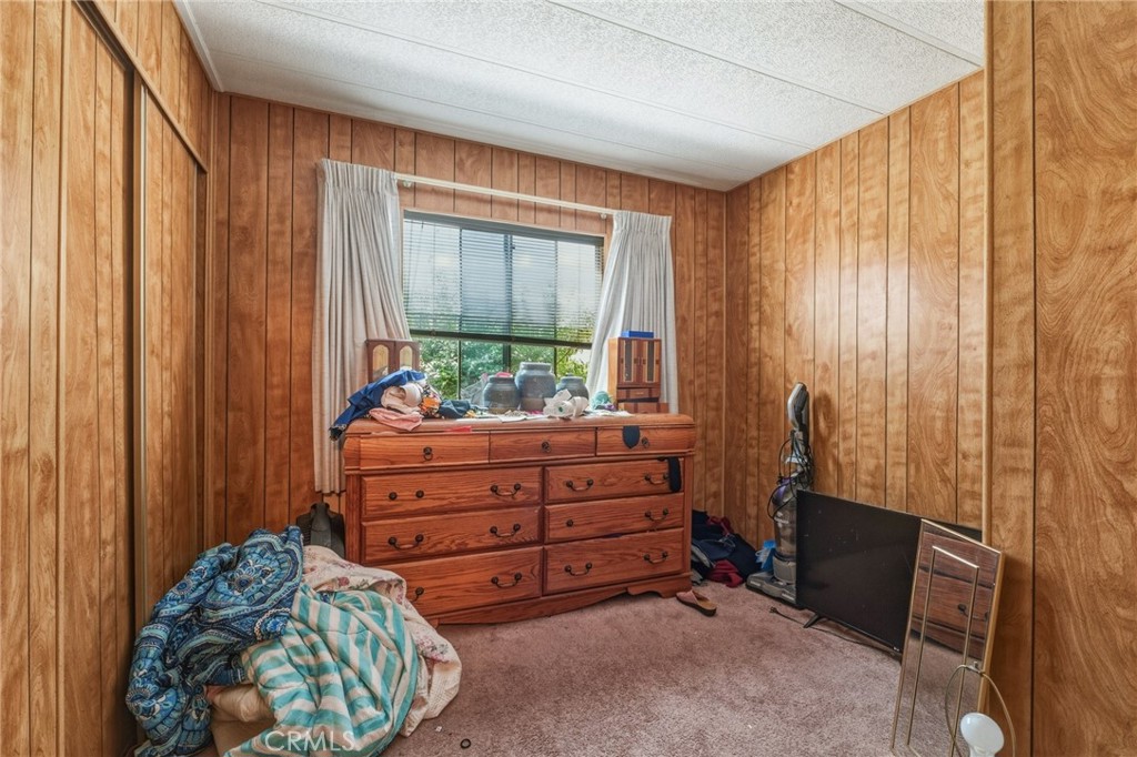 20683 Waalew Road, Unit B201 Apple Valley, CA 92307 - Photo 20 of 32 a room with furniture and a window