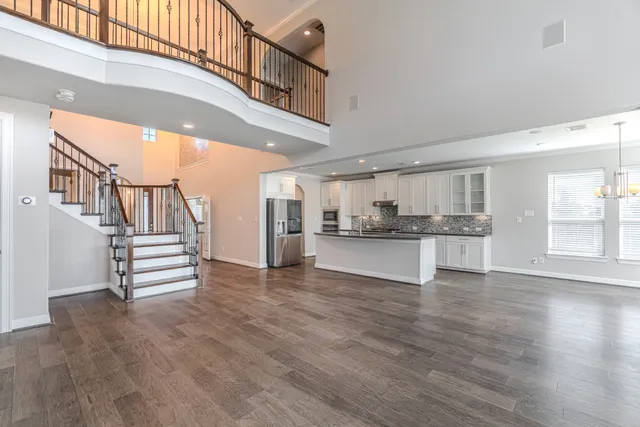 a view of an entryway with kitchen