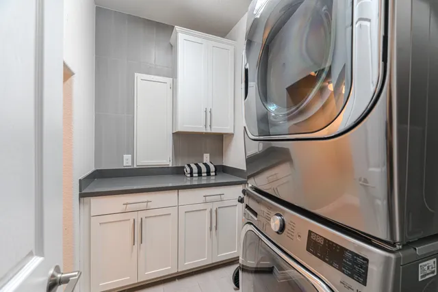 a view of entryway with wooden floor and stairs