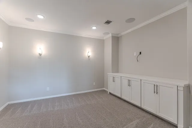 a view of balcony with wooden floor