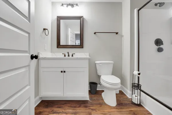 a view of entryway with wooden floor