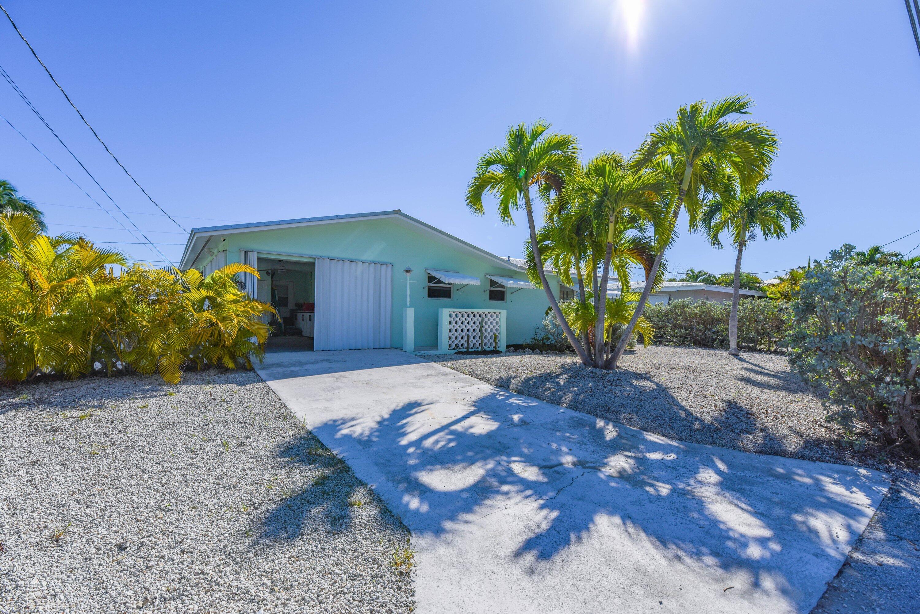 1567 Watson Boulevard Big Pine Key, FL 33043 - Photo 52 of 57 a view of a backyard