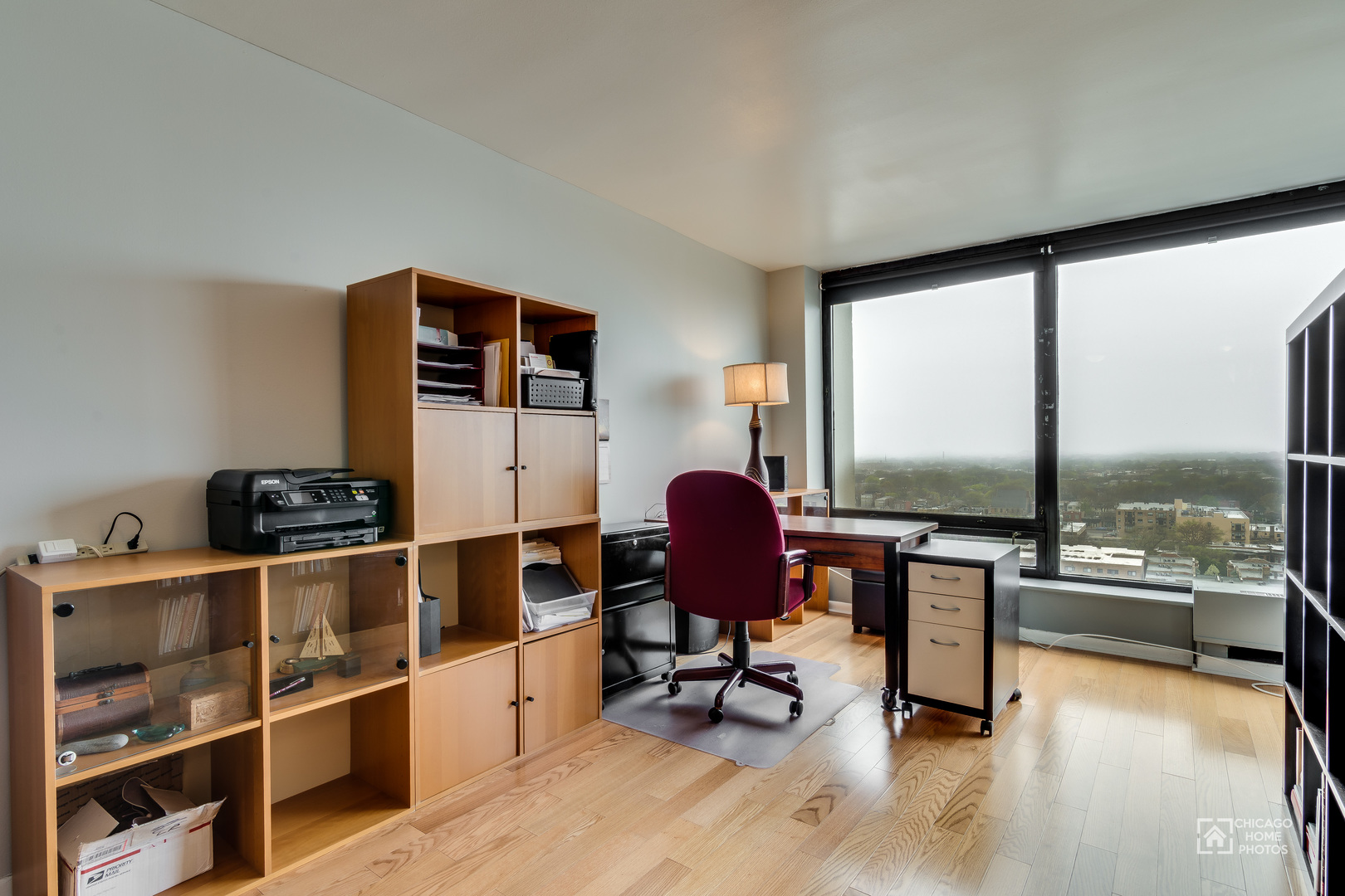 5445 North Sheridan Road, Unit 1809 Chicago, IL 60640 - Photo 2 of 18 a workspace with furniture window and outside view