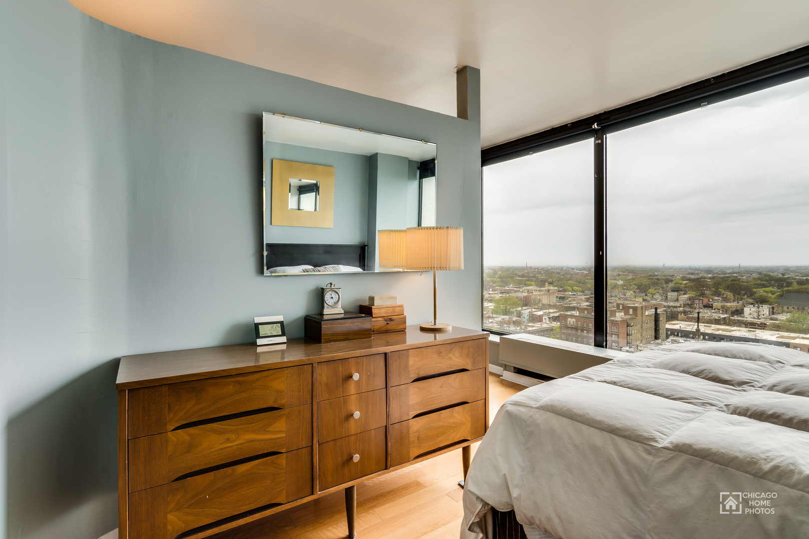 5445 North Sheridan Road, Unit 1809 Chicago, IL 60640 - Photo 11 of 18 a bedroom with a bed and a large window
