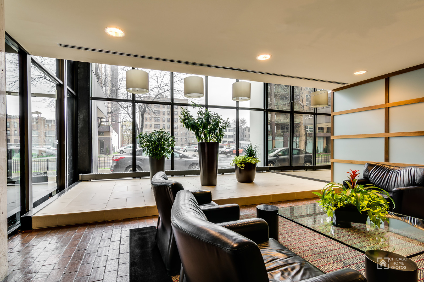 5445 North Sheridan Road, Unit 1809 Chicago, IL 60640 - Photo 18 of 18 a lobby with furniture and floor to ceiling window