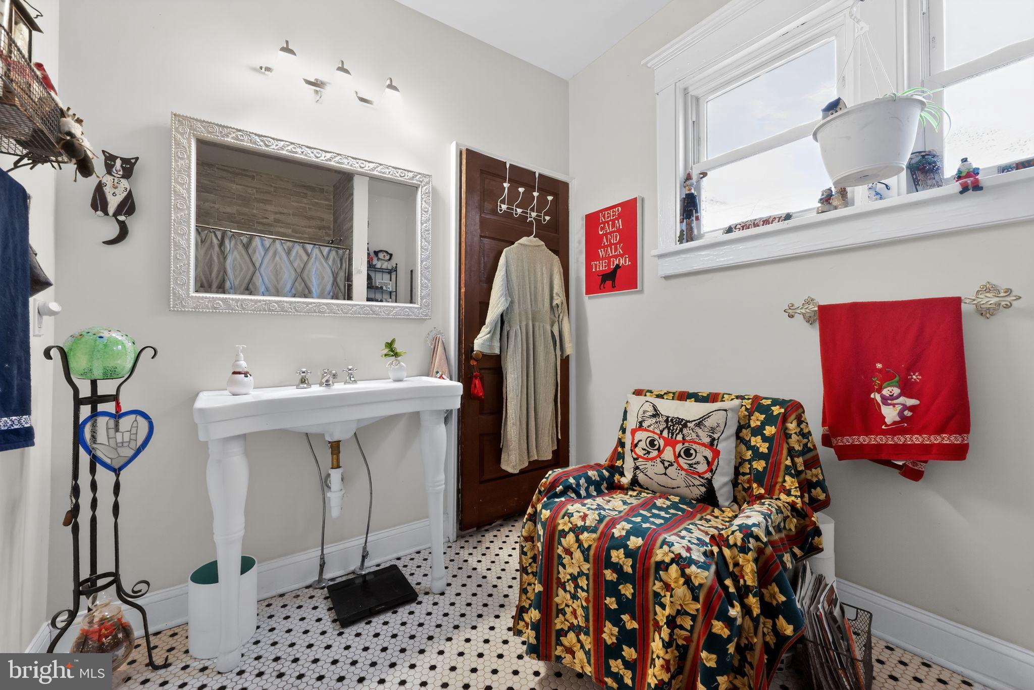 225 Rutland Avenue Mount Holly, NJ 08060 - Photo 16 of 30 a bedroom with furniture and a chandelier