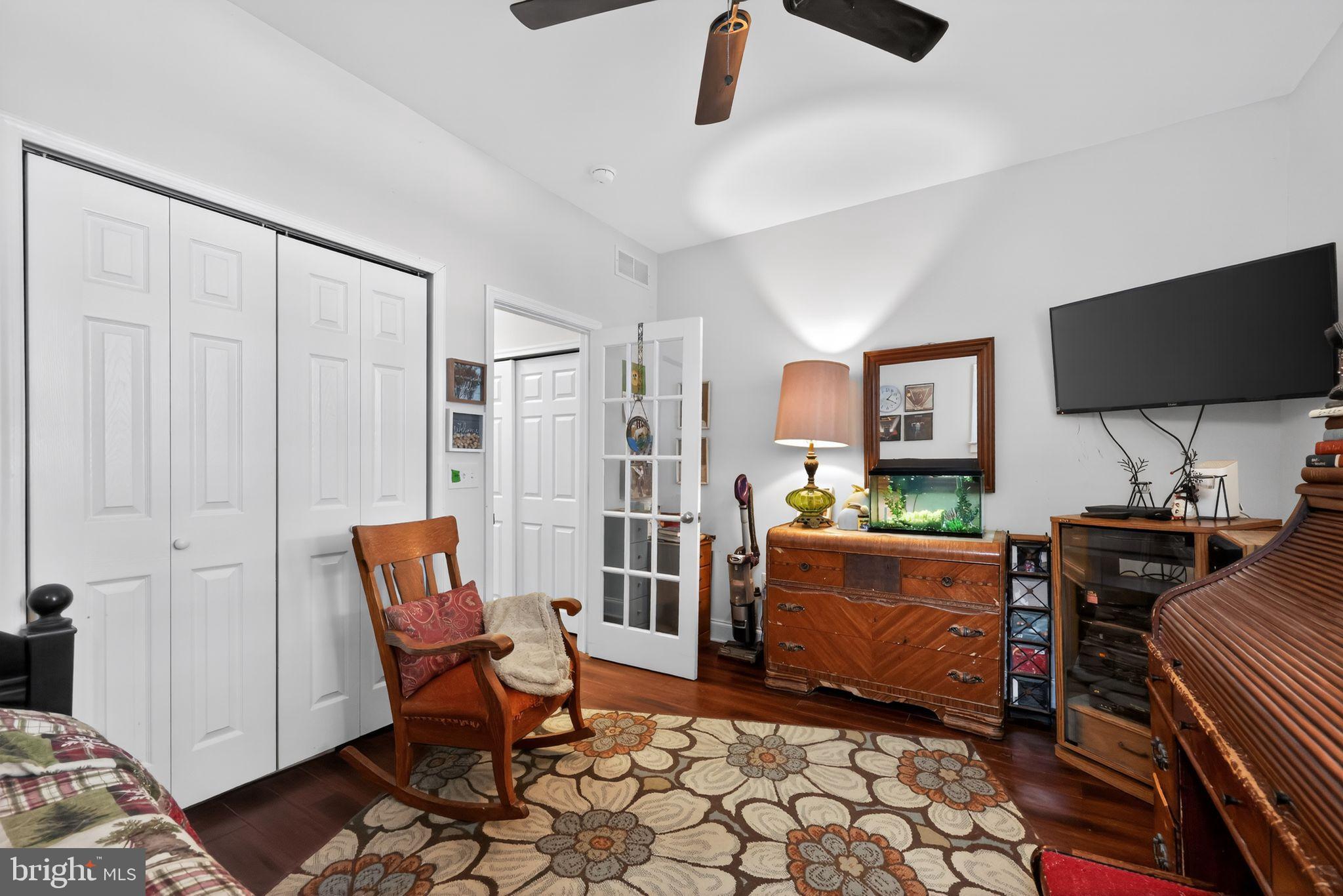 225 Rutland Avenue Mount Holly, NJ 08060 - Photo 17 of 30 a living room with furniture and a flat screen tv