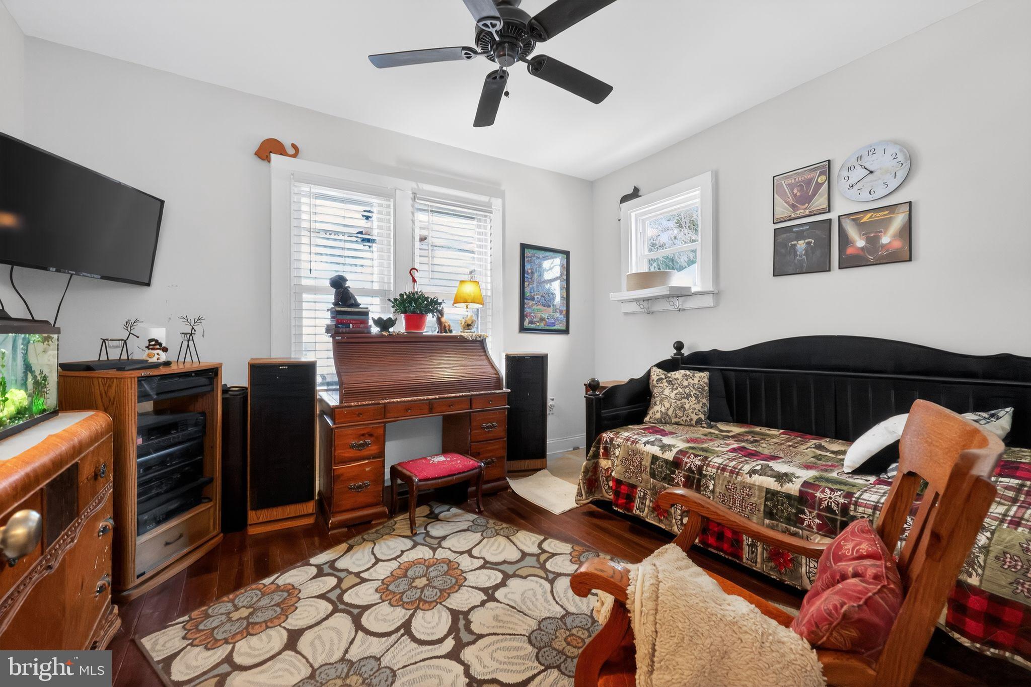 225 Rutland Avenue Mount Holly, NJ 08060 - Photo 18 of 30 a bedroom with two beds and a flat screen tv