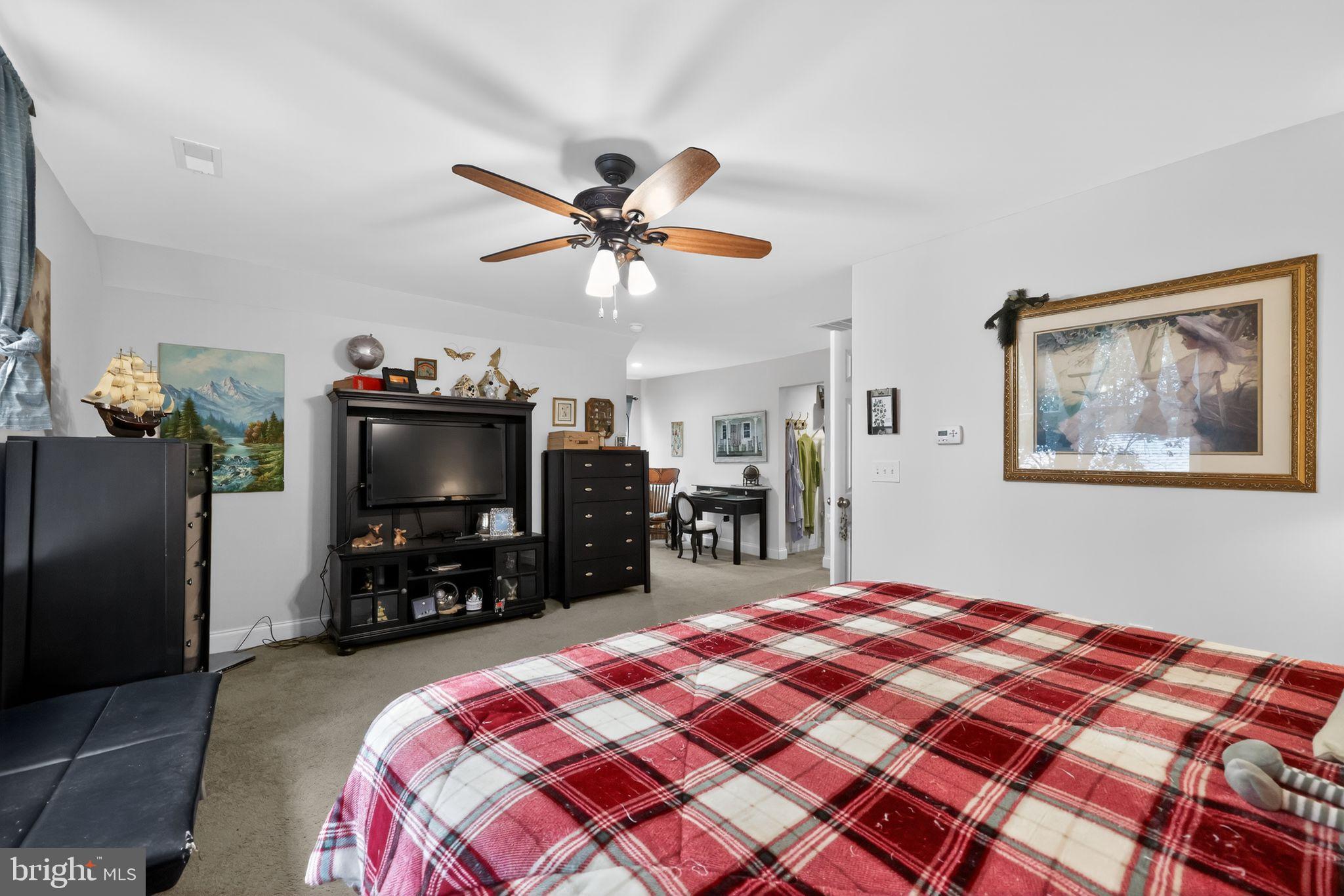 225 Rutland Avenue Mount Holly, NJ 08060 - Photo 23 of 30 a bedroom with a bed and a flat screen tv