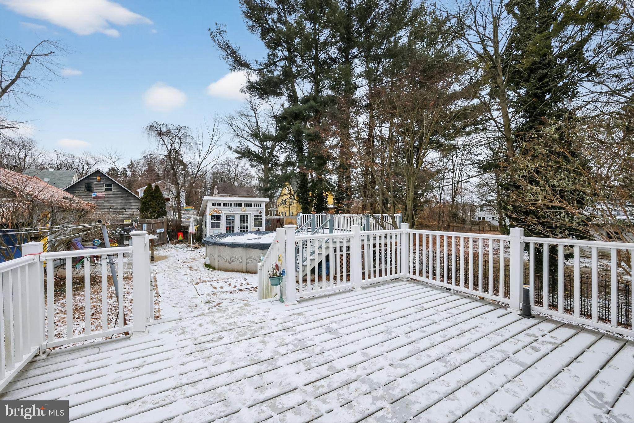 225 Rutland Avenue Mount Holly, NJ 08060 - Photo 26 of 30 a roof deck with couches and wooden fence