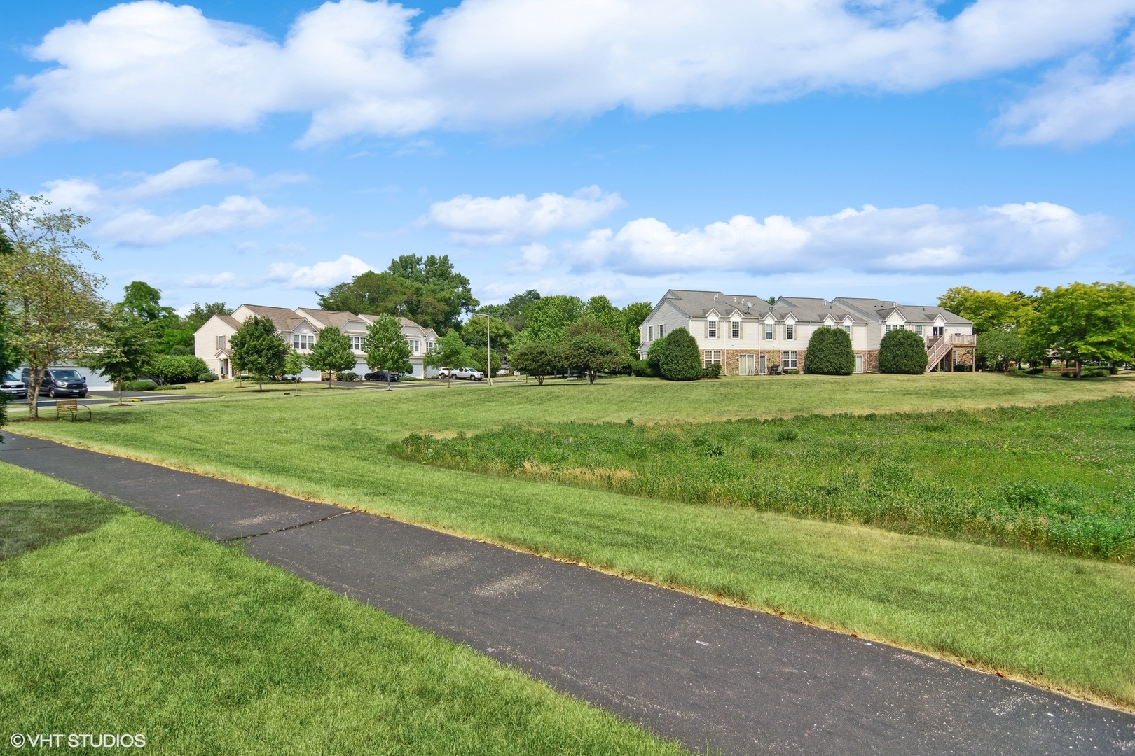 655 Pointe Drive Crystal Lake, IL 60014 - Photo 21 of 22 a view of a golf course with a garden