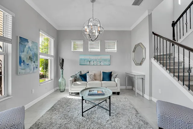 a large kitchen with stainless steel appliances granite countertop a lot of counter space and a sink