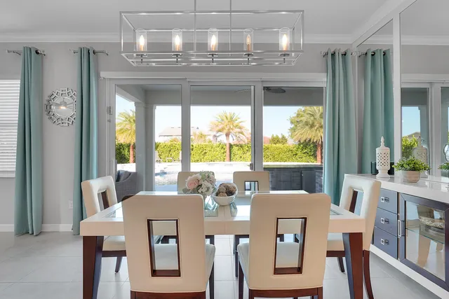 a bedroom with a bed and a television