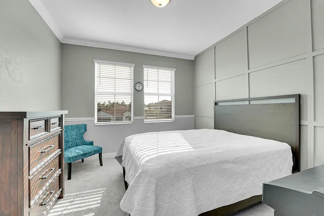 a bathroom with a sink double vanity and a mirror