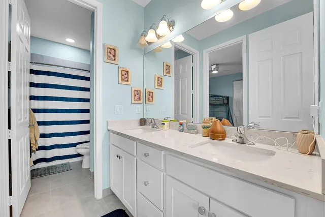 a view of a house with swimming pool and sitting area